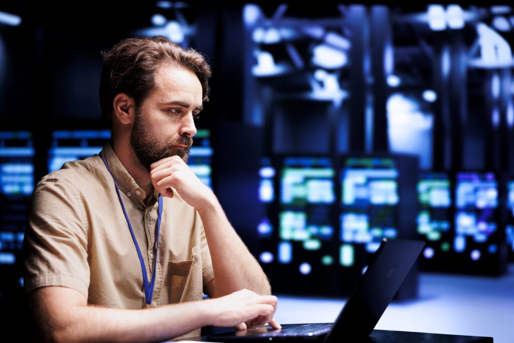 Employee overseeing supercomputers