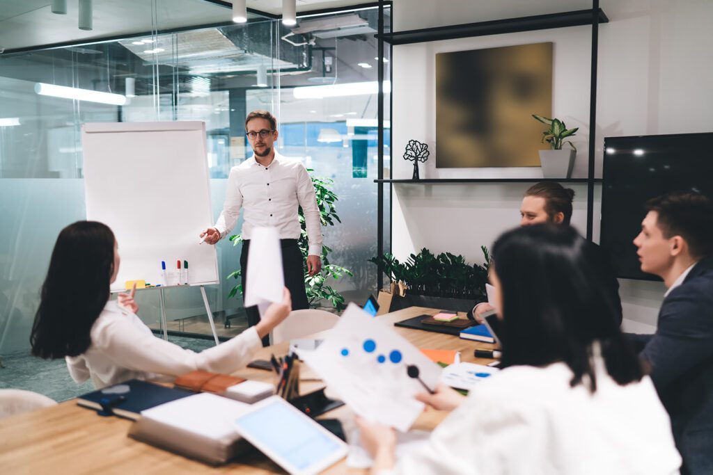 group of IT professionals in a training meeting